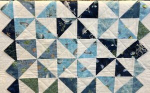 Read more about the article Half-inch Triangles and Prairie Points